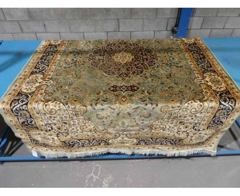 A modern Middle Eastern silk Rug, jade green ground, 225cm by 160cm plus tasselled ends 