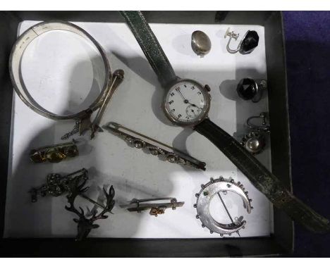 A silver cased early 20th century Wrist Watch and twelve items of white metal jewellery including a silver Bangle, six Brooch