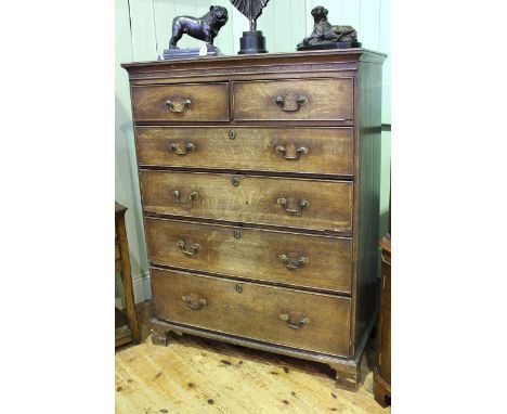 Georgian oak chest of two short above four long graduated drawers on bracket feet
