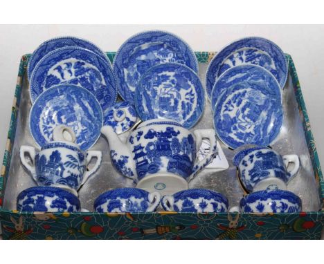 Blue willow pattern porcelain child's tea service for four, in original printed card box