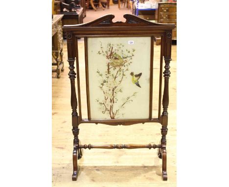 Victorian mahogany firescreen having painted glazed panel