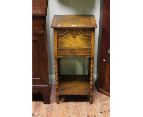 Oak bobbin leg sewing table having hinged box lid above a drawer with undershelf below