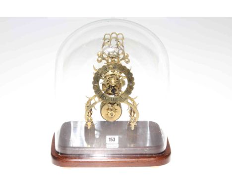 Brass skeleton mantel clock with fusee movement under glass dome
