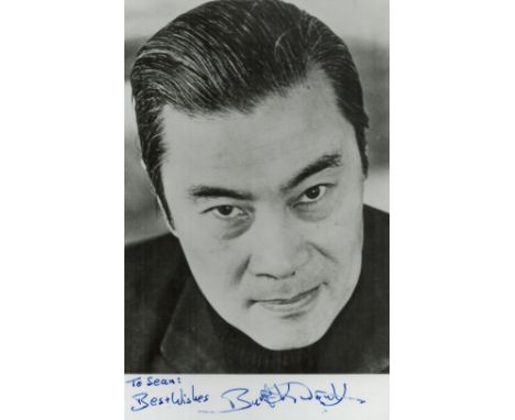 Burt Kwouk OBE signed black & white photo 5.5x3.5 Inch. Dedicated. Includes TLS signed dated 17th April 1989.  Was a British 