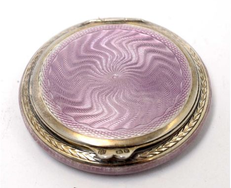 A George V silver and purple enamel powder compact, by Charles S Green &amp; Co Ltd, Birmingham 1929, the engine turned guill