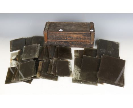 A quantity of late 19th and early 20th century glass photographic magic lantern slides, including 3-inch slides of geographic
