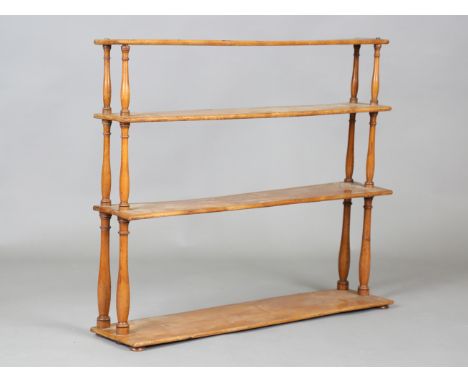A Victorian ash four-tier hanging wall shelf, height 69.5cm, width 81cm, depth 19cm.Buyer’s Premium 29.4% (including VAT @ 20