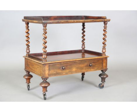 A mid-Victorian rosewood two-tier whatnot by 'Wilkinson, 14 Ludgate Hill', fitted with a single drawer and raised on turned l