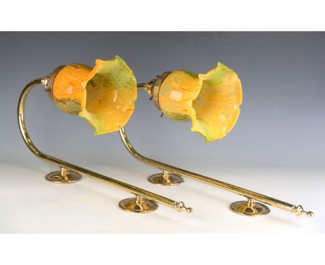 A pair of late 20th century gilt brass single light wall sconces by Christopher Wray, each mottled glass shade supported on a