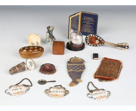 A group of collectors' items, including three 18th century enamel decanter labels, width 5.8cm (some faults), a walnut and mo