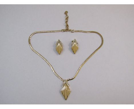 A 1980's Dior jewellery set comprising necklace and clip on earrings, all fully marked 