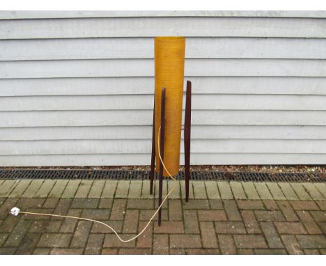 A 1960s teak rocket floor lamp with spun fibreglass shade, 111cm high 