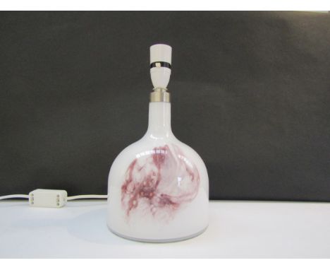 A Holmegaard glass table lamp designed by Michael Bang in white with pink swirl detail. 28cm high including fitting 