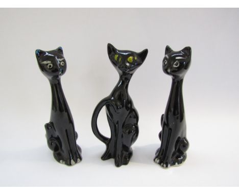 Three black glazed ceramic cats, two in style of Schmider 1950's, tallest 22.5cm 