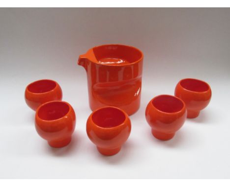 A 1970s ceramic orangeade set by Georges Lanteri comprising of a pitcher and five beakers. Tallest 17cm 