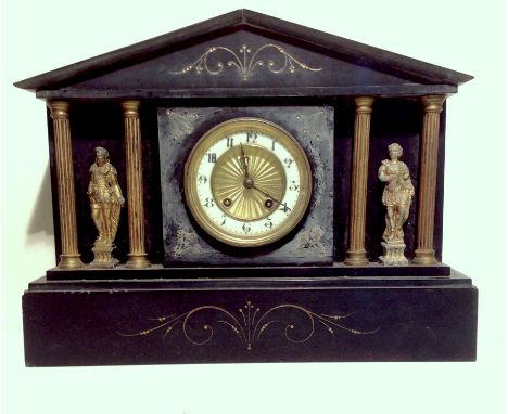 A large black slate French mantle clock.