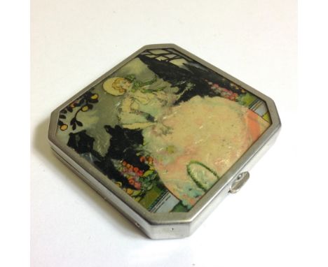 A powder compact, decorated with a reflective garden scene featuring a central bonneted lady. The reverse having engine turne