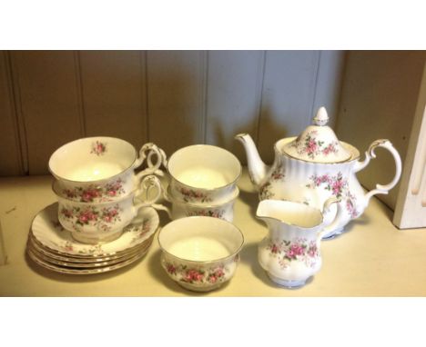 A Royal Albert Lavender Rose pattern 11 piece tea set with a Theodore Haviland, Limoges, rose pattern lidded jug. 
Condition: