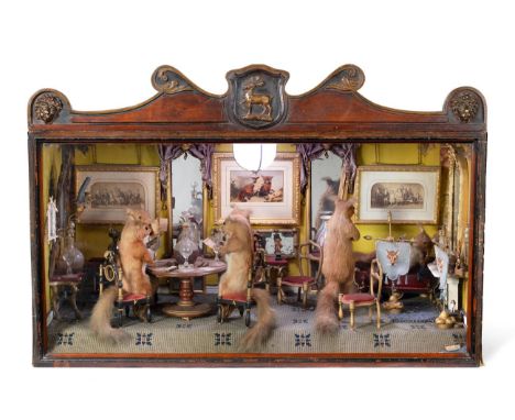 Taxidermy: A Large Cased Anthropomorphic Diorama of Card Playing Red Squirrels, circa 1870-1900, probably Austro-German, six 