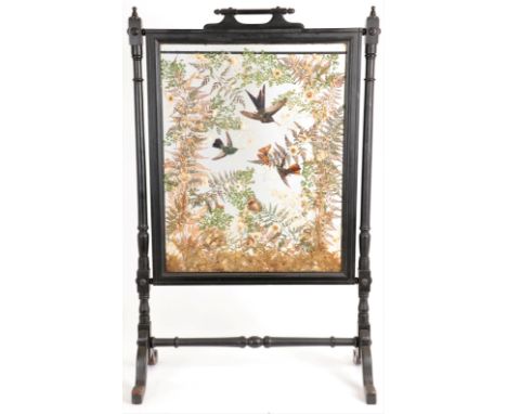 Taxidermy: An Edwardian Humming Bird Diorama Firescreen, three full mount Humming Birds in flying pose, amidst a natural dior