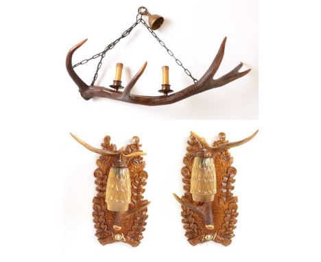 Antler Furniture: A Pair of Carved Austro-German Wall Lights, circa late 20th century, a pair of carved oak wall lights, each