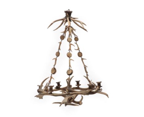 Antler Furniture: An Austro-German Red and Fallow Deer Antler Seven-Light Corona Chandelier, circa 1870, suspended from three