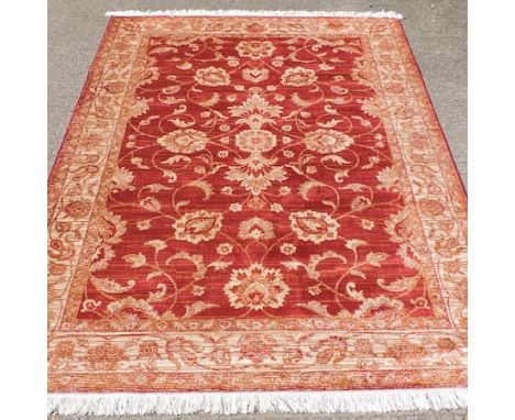 A Ziegler carpet on red ground, 280 x 200cm