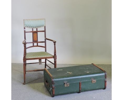 A late 19th century mahogany and inlaid open armchair, together with a cane bound cabin trunk 