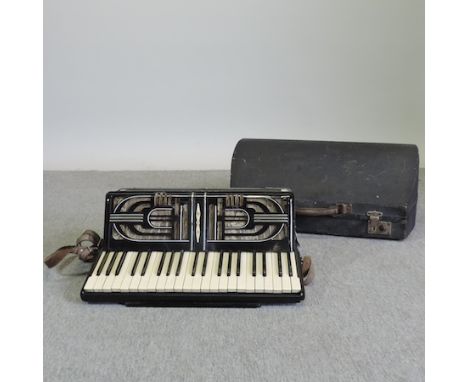 A Hohner accordion, cased 