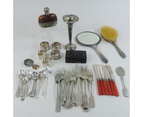 A collection of silver and plated items, to include napkin rings, cutlery, an ebonised box, a hip flask and a silver spill va