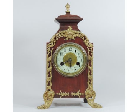 An early 20th century French gilt metal mounted mantel clock, 38cm tall