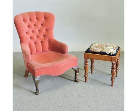 A Victorian tapestry upholstered footstool, together with a red upholstered armchair 