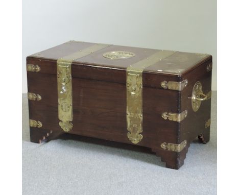 A Chinese elm and brass bound trunk, 102cm
