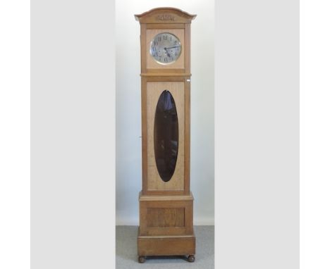 An early 20th century light oak longcase clock, 220cm