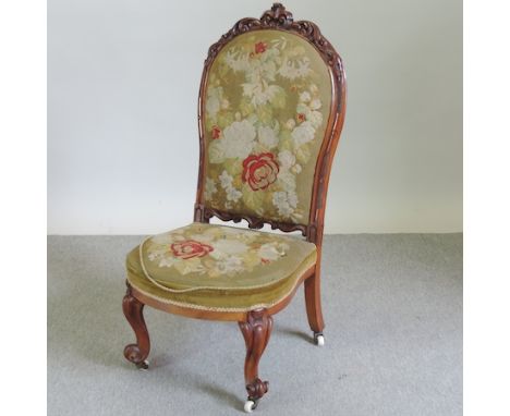 A 19th century carved walnut and tapestry upholstered side chair