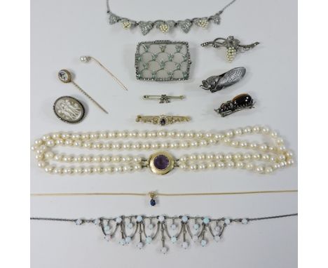 An 18 carat gold necklace, with a sapphire pendant, together with an opal openwork necklace, a pearl necklace with amethyst c