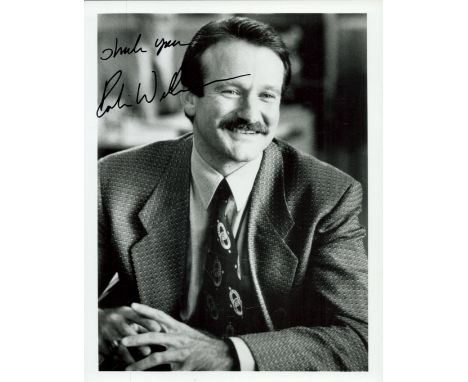 Robin Williams (1951 2014), a signed 10x8 photo. An American actor and comedian, he is regarded as one of the greatest comedi