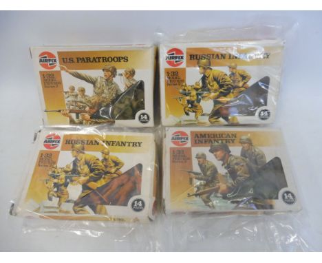 Four Airfix 1/32 scale boxed soldiers including US Paratroopers and Russian Infantry. 