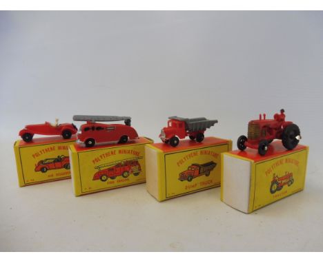 Four boxed Made in Hong Kong early polythene miniatures, a fire engine, a dump truck, an MG roadster and a tractor.