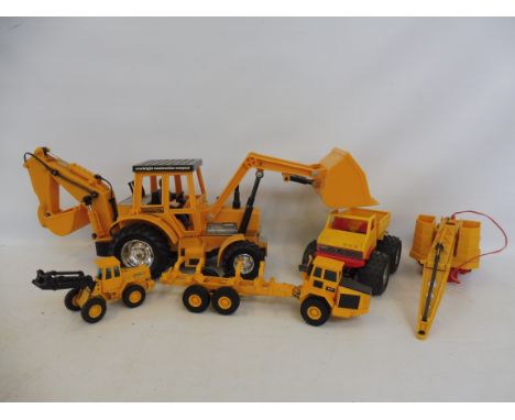 A selection of farm construction vehicles including the EBCC 499 tractor and excavator. 