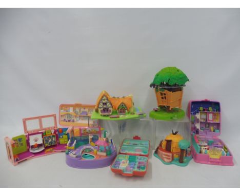 Seven vintage Polly Pocket playsets marked Bluebird Swindon England.
