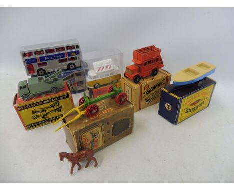 A collection of six boxed small scale models by Matchbox, Benbros, Charbens and Schuco.