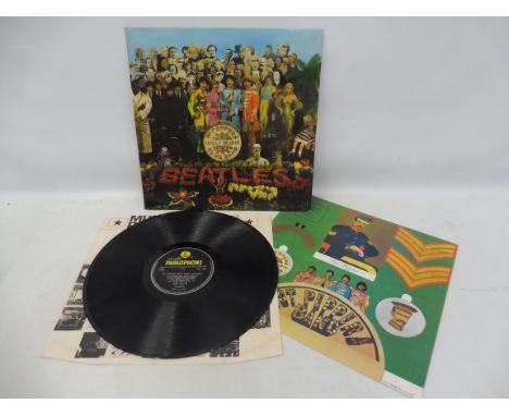 Beatles Sgt. Pepper's Lonely Hearts Club Band first press, G&amp;L laminated gate fold, visible flaps, gate fold sleeve, red 
