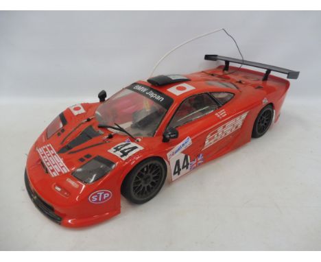 A Kyosho BMW 24HR Le Mans sports car 1997 race, on a twin alloy chassis 2WD fitted with a GS11X nitro engine, very clean with