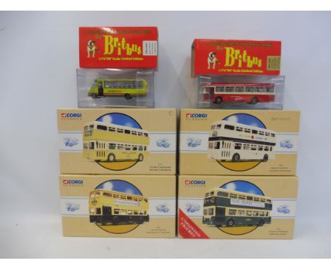 Six boxed Corgi Classic buses.