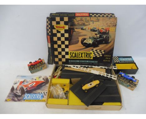 A circa 1960s Tri-ang Scalextric race car set, two boxed slot cars etc.