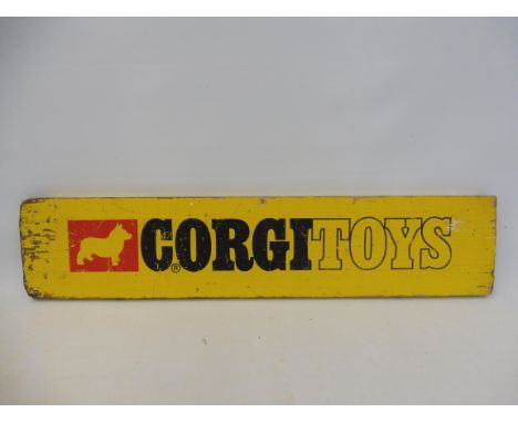 A Corgi Toys wooden toy shop advertising sign, circa 1960s.