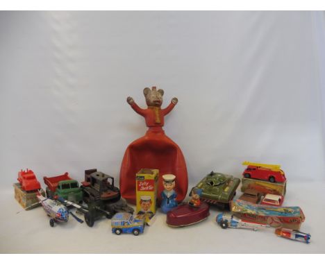 A quantity of tin plate and motorised vehicles to include a Marx tank, bulldozer etc.