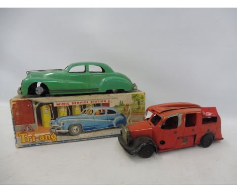 A boxed Tri-ang Minic no.2 clockwork saloon car, tyres missing, otherwise car in good condition for age plus a playworn fire 