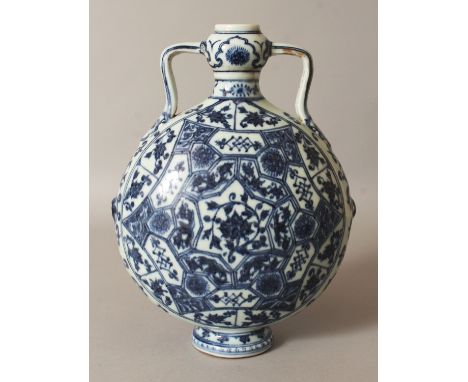 A CHINESE MING STYLE BLUE & WHITE PORCELAIN MOON FLASK, each domed surface decorated with a multitude of lotus and other pane